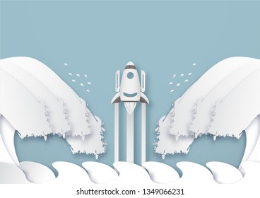 Vector illustration with start up concept in paper cut, craft and origami style. Rocket is flying on blue sky. Template design for web banner, poster, cover, advertisement. It's art craft for kids .
