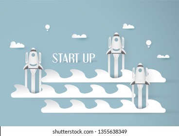 Vector illustration with start up concept in paper cut, craft and origami style. Rocket is flying on blue sky. Template design for web banner, poster, cover, advertisement. It's art craft for kids .