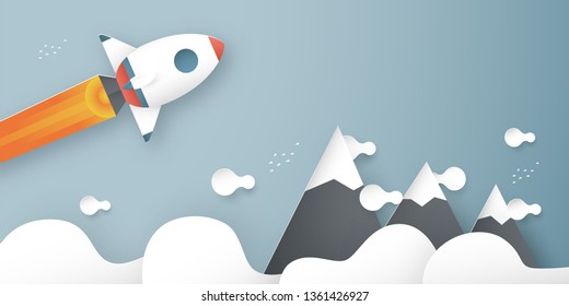 Vector illustration with start up concept in paper cut, craft and origami style. Rocket is flying on blue sky. Template design for web banner, poster, cover, advertisement. It's art craft for kids.