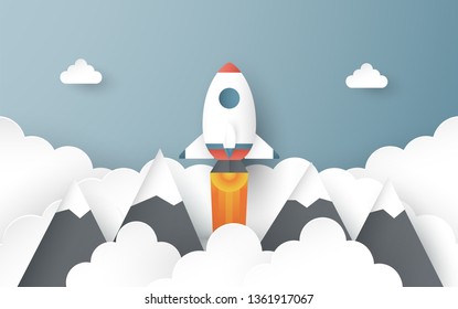 Vector illustration with Start Up concept in paper cut, craft and origami style. Rocket is on blue sky background. Template design for web banner, poster, cover, advertisement. Art craft for kid.