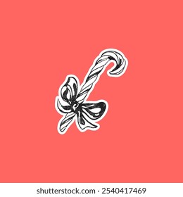 Vector illustration of a sticker with a Christmas striped lollipop with a photocopy effect. Candy stick decorated with a bow in a black and white grunge retro style on a cross isolated background.