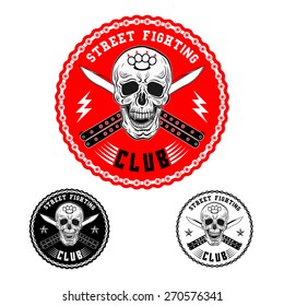 Vector illustration street fighting club emblem with skull, brass knuckles, knives and chain. 