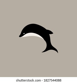 Vector illustration of a stylized killer whale.Logo.Flat design.
