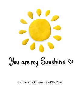 Vector illustration of sun with text "You are my sunshine".