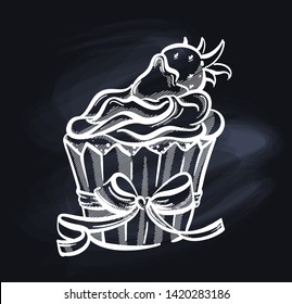 Vector illustration of sweet cute cupcake on the blackboard. Hand drawn sketch style