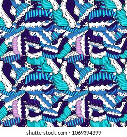 Vector illustration. Sweets background design. Seamless pattern with sweet Cupcakes pattern. Nice birthday background on blue, white, black, gray and purple.
