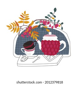 Vector illustration with a tea set, cups, teapot, against the background of mountain ash and barberry branches. Mixed flat and linear style. Concept of home comfort, the autumn season, tea drinking.
