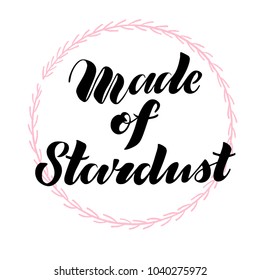 Vector illustration of textured brush lettering quote Made of Stardust in pink floral wreath for print, card, blog, banner or other design project