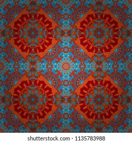 Vector illustration. Textured seamless pattern. Orient popular style. Sloping seamless colorful ornament for design and backgrounds. Abstract blurred paisley orange, red and blue ornament.