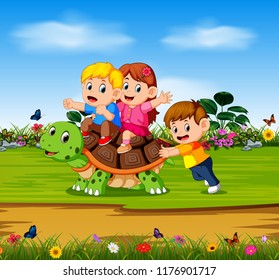 vector illustration of the three children are playing on the big turtle in the forest