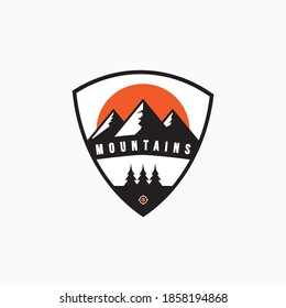 Vector illustration of three mountains with sun behind and pine trees good for adventure logo, badge, emblem, and sticker design
