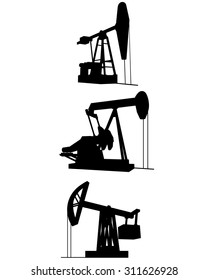 Vector illustration of a three oil pumps silhouettes