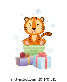 Vector illustration tiger sitting on gift boxes with Christmas toys