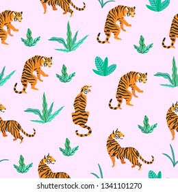 Vector illustration of tigers with tropical leaves on a pink background. Trendy seamless pattern.