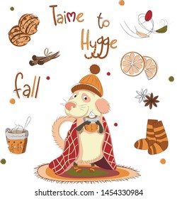 
Vector illustration with Time to Hygge lettering and cozy home things like candles, socks, rug, tea, Danish living concept. Greeting card template, hand drawn style.