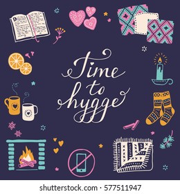 Vector illustration with Time to Hygge lettering and cozy home things like candles, socks, rug, tea, fireplace. Danish living concept. Greeting card template, hand drawn style.