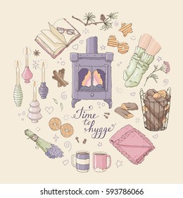 Vector illustration with Time to Hygge lettering and cozy home things like candles, socks, tea, fireplace designed in a circle. Danish living concept. Greeting card template, hand drawn style.