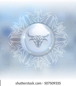 A vector illustration of a transparent snow globe in a frame on the blurred background with a zodiac sign Taurus. 