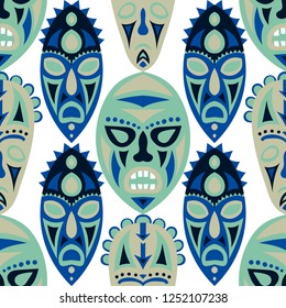 Vector Illustration. Tribal Seamless Background with Ritual Masks for Card or Poster. Ethnic Seamless Pattern with Color Trible Shamanic Masks for your Design. Vector Texture.