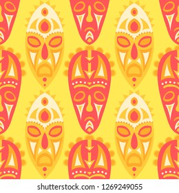 Vector Illustration. Tribal Seamless Background with Ritual Masks for Textile or Paper. Ethnic Seamless Pattern with Color Trible Shamanic Masks for your Design. Vector Texture.
