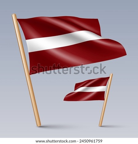 Vector illustration of two 3D-style flag icons of Latvia isolated on light background. Created using gradient meshes, EPS 10 vector design elements from world collection
