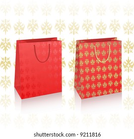 Ilustración vectorial de dos bolsas, rojas y doradas con espacio de copia
