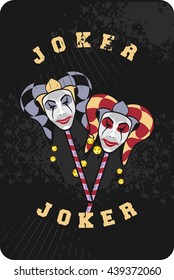 vector illustration of two joker mask on a black background playing card