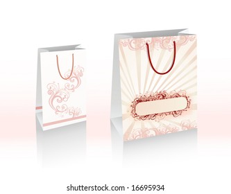 Vector illustration of two shopping bags with floral patterns