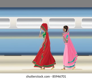 vector illustration of two traditionally dressed indian ladies walking along a railway station platform as a modern train speeds by in eps 10 format