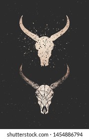 Vector illustration with two variants of hand drawn bull skulls on black background. Gold silhouettes and contour with grunge texture. For you design, print, tattoo or magic craft.