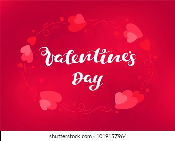 Vector illustration Valentines day on an blurred background with hearts.Hand lettering Valentines day  for cover, banner, poster, card, billboard, sticker, flyer.Calligraphic design.Text background.