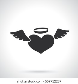 Vector illustration. Valentine's Day symbol. Silhouette of angel heart with wings and a halo. Template or pattern. Decoration for greeting cards, wallpapers, emblems
