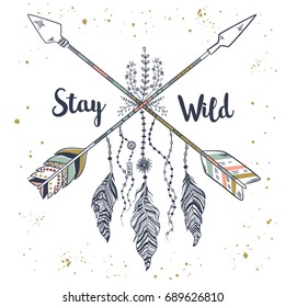 Vector illustration in vintage boho style with tribal ethnic crossed arrows, feathers, floral decoration and beads. American indian motifs. Boho style. "Stay wild" motivational poster