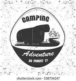 Vector illustration of vintage camping and outdoor adventure emblems, logos and badges. Camping equipment. Camp trailer in the forest.