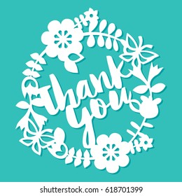 A vector illustration of vintage paper cut floral wreath with thank you phrase. The lace is white on a blue background.