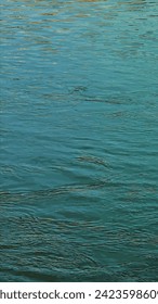Vector illustration of the water surface texture of the Salzach river. Vectical 9 by 16
