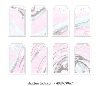 Vector illustration of watercolor tag set. Collection of pink and blue watercolor paint blots. Hand drawn marble texture. Isolated on white background. For invitation, greeting card, save the date. 