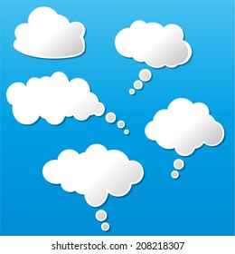 Vector illustration of white clouds on blue background