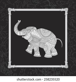 Vector illustration of white elephant silhouette with grey ethnic tribal ornament on black background with decorative carved frame