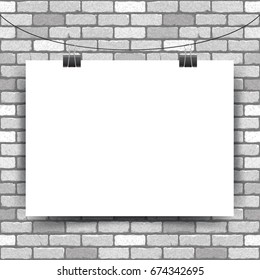 Vector illustration of a white horizontal poster hanging on clerical clips on a white brick wall background