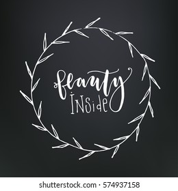 Vector illustration. White ink hand drawn floral wreath on black background, can use for birthday greeting, post cards, template. "Beauty inside" - hand written modern calligraphy inscription.