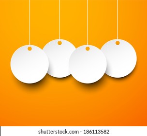 Vector illustration of white paper round labels over orange.