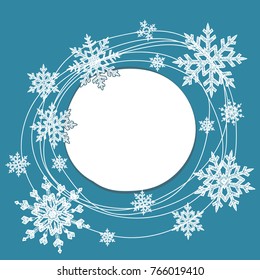 Vector illustration of the white snow round frame with doodle snowflakes.