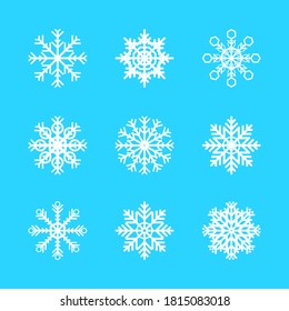 Vektorgrafik weißer Schneeflocken auf blauem Hintergrund