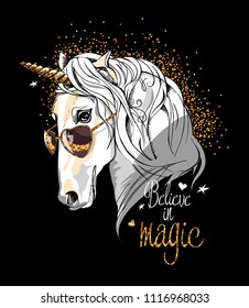 Vector illustration. White Unicorn with a golden sparkle horn and in a sunglasses on a black background. Believe in magic - lettering quote. Poster, t-shirt composition, hand drawn style print.