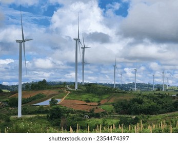 Vector illustration with wind turbines at sunset. Modern windmills as part of natural landscape. Aerial view of a windmill or windmill in the mountains of Phetchabun, Thailand. vector, art, windmill.