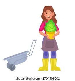 Vector illustration of a woman working in the garden or on the farm. hobbies, lifestyle. flat style.