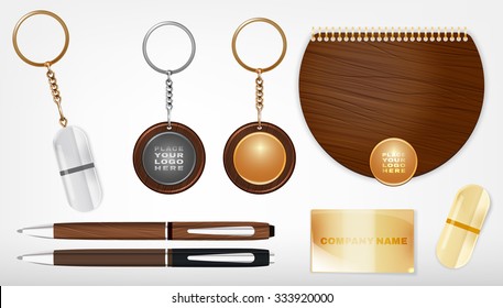 Vector illustration of a wooden and metal souvenirs with a rings for a key, notebook and pens Isolated on a white background. Ideal template for branding, identity guidelines and promo campaigns.