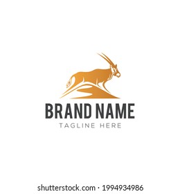 vector illustrations. logo shape like a animal antelope in desert.