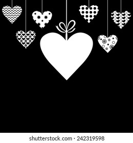 Vector illustrations of Valentine card with hanging decorative white hearts on black background